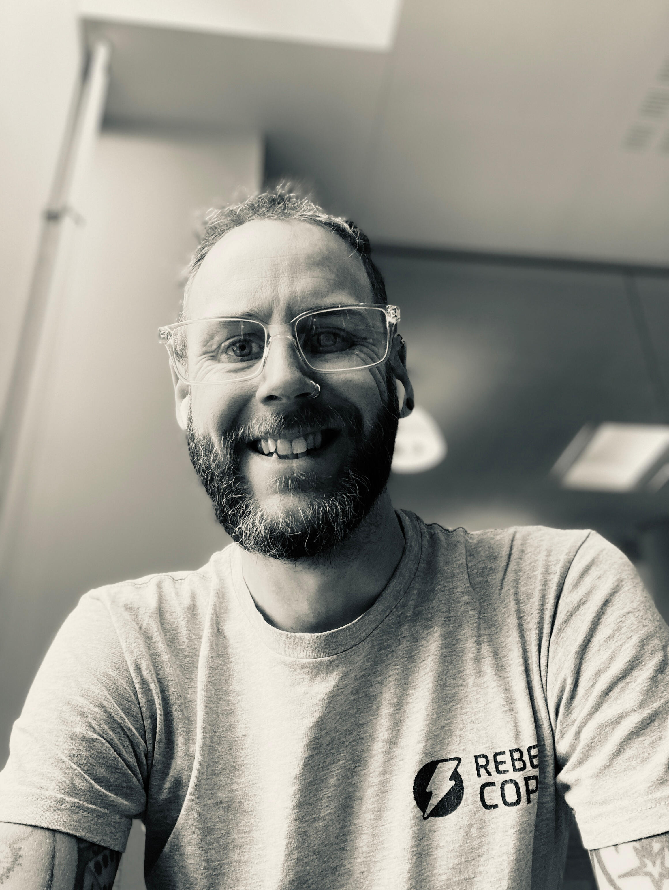 Wall art that says "Punch today in the face." (Photo from Unsplash)